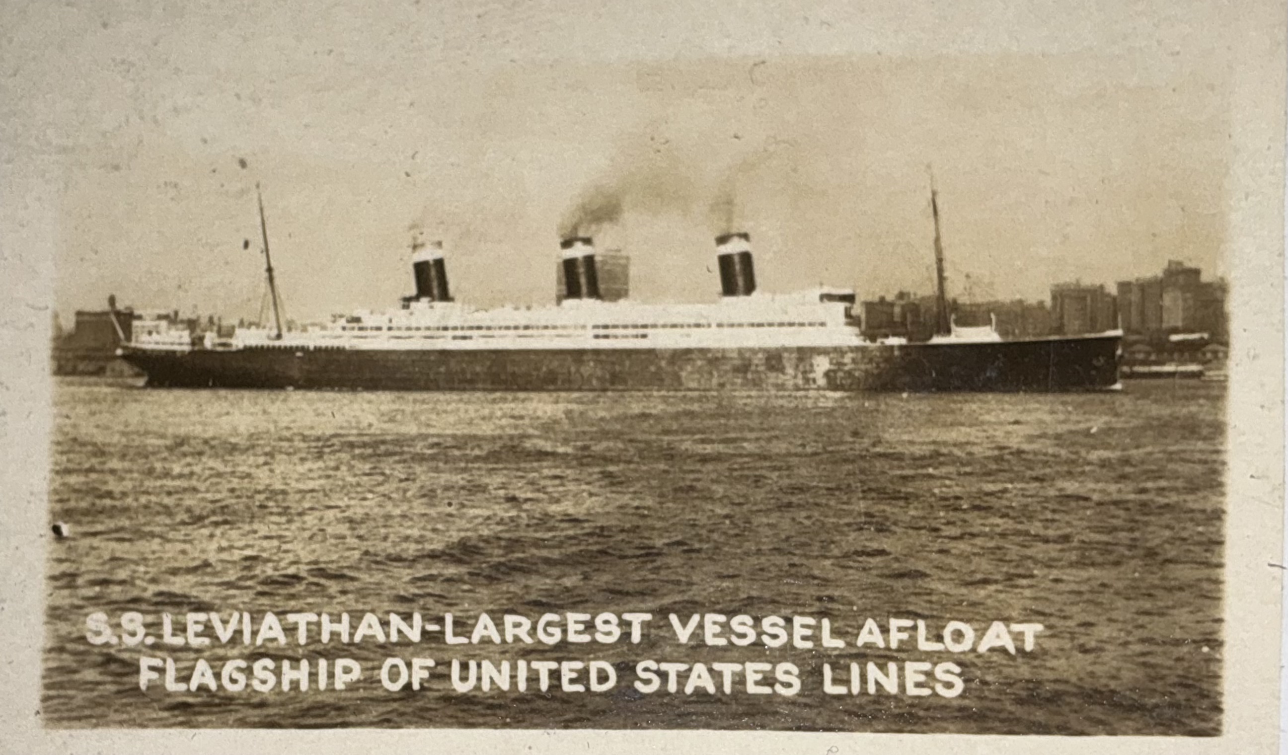 Exterior portrait captioned as the flagship of United States Lines.