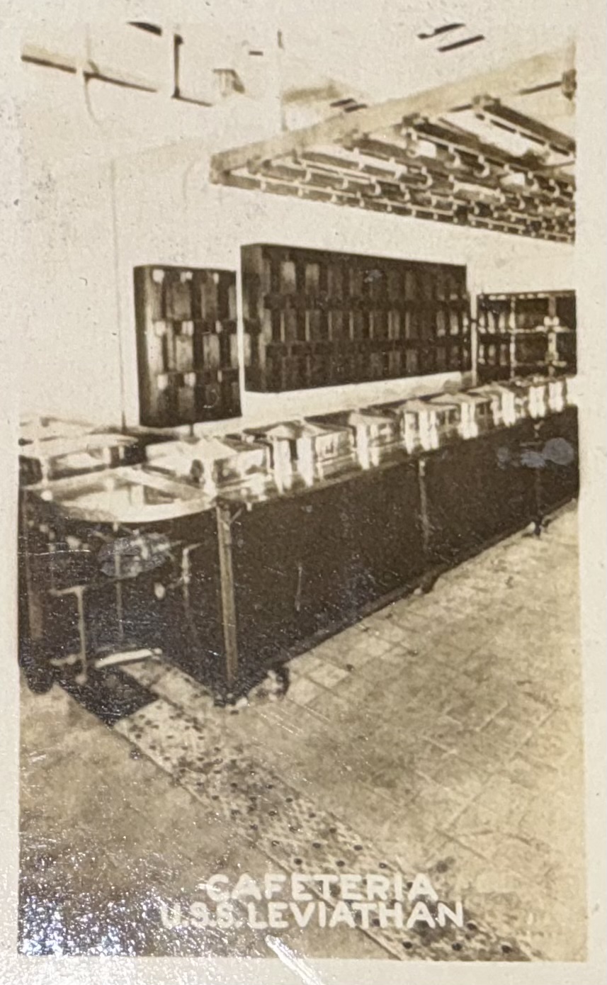 Cafeteria service counter, shelving and equipment.