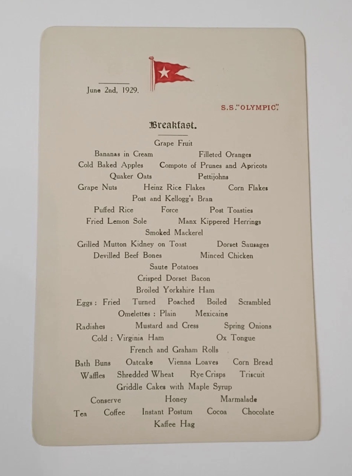 SS Olympic breakfast menu card, dated June 2nd, 1929, with White Star Line house flag at top.